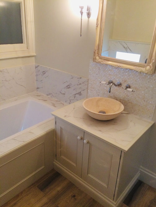 marble bathroom sink and bath